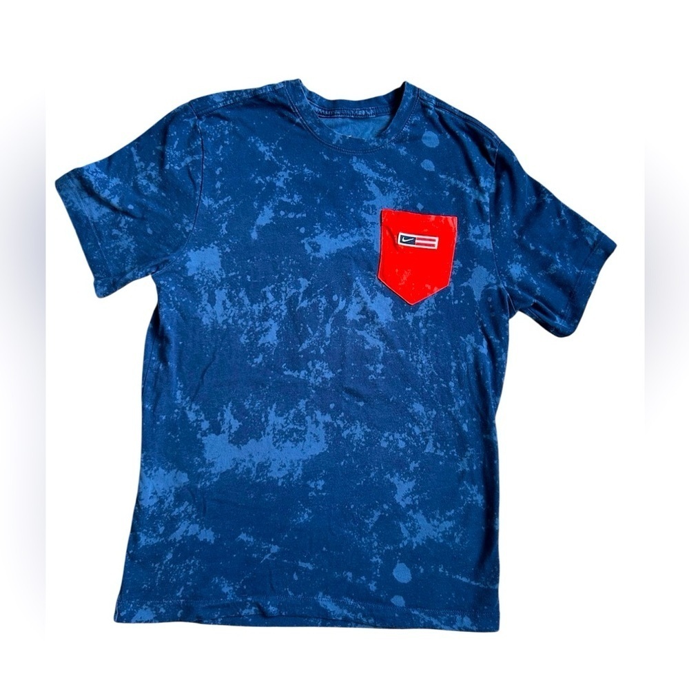 5/$25 The Nike Tee in red, white and blue tie dye like pattern size medium